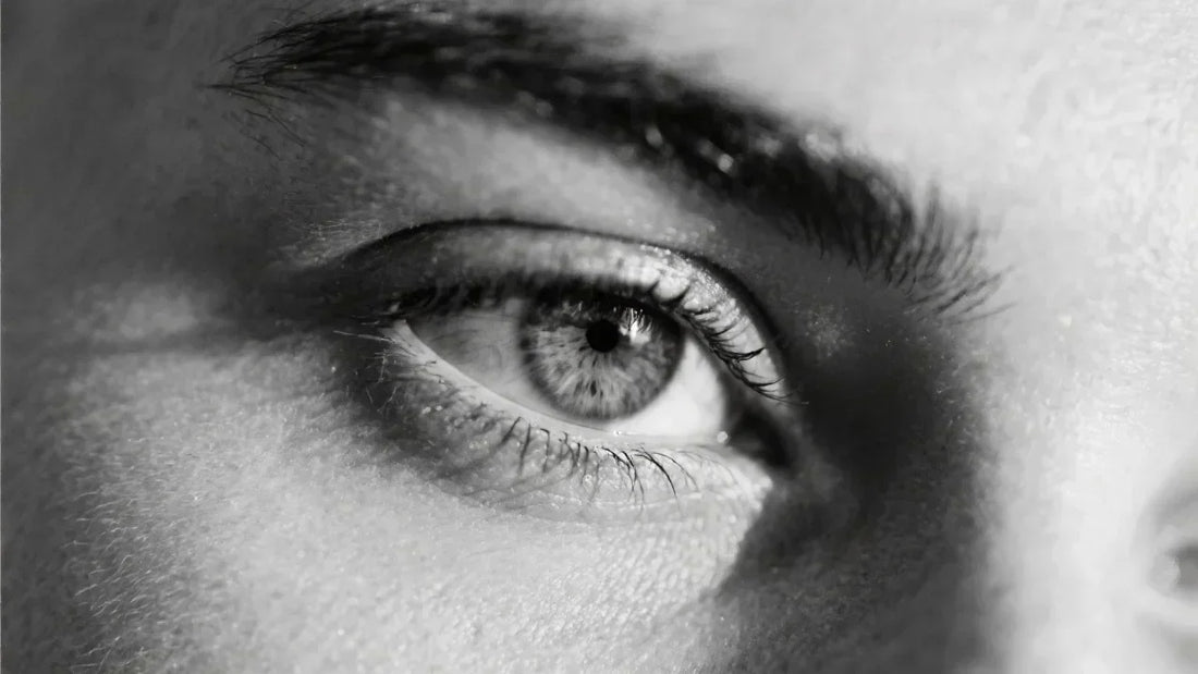 Weary looking woman's face and eye up close